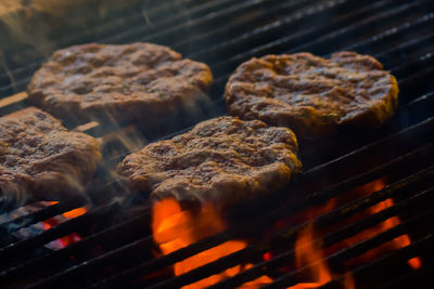 Close-up of meat on barbecue grill