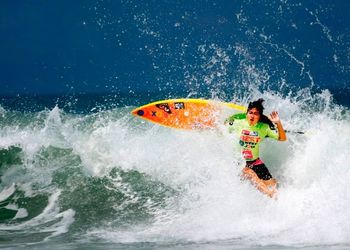 Man surfing on sea