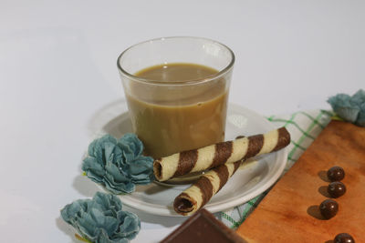 Close-up of coffee served on table