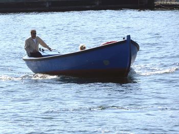 Man on boat in sea