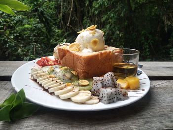 Close-up of breakfast served on table