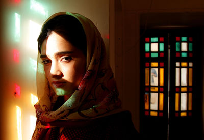 Portrait of young woman looking away