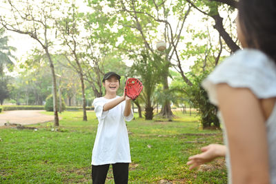 Young woman standing on field