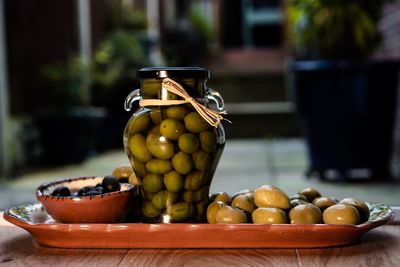 Close-up of olives on table