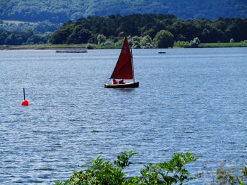 Boats in calm lake