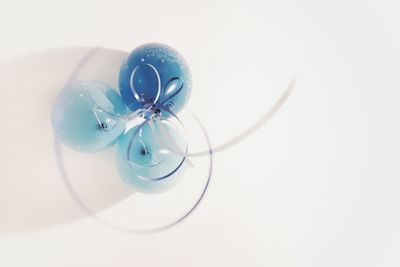 High angle view of blue ball on white background