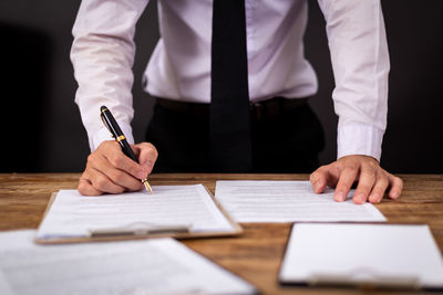 Midsection of a man on table