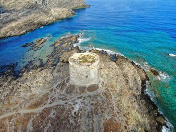 High angle view of rocks on shore