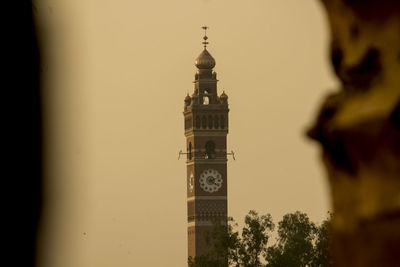 Clock tower against sky