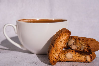 Close-up of coffee cup on table