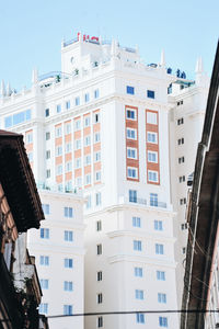 Low angle view of buildings against clear sky