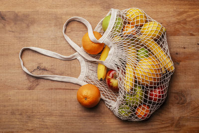 High angle view of oranges on cutting board