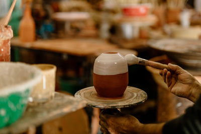 Artisan working with clay