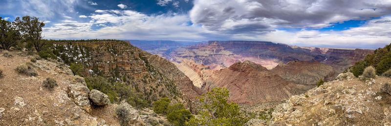 View of the grand canyon from the south rim in arizona. grand canyon national park. clouds and sun.