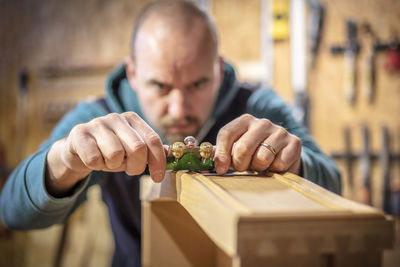 Midsection of man preparing food