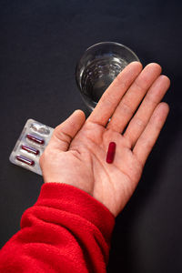 Cropped image of man holding water