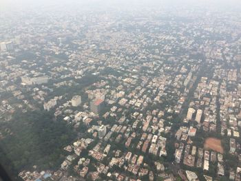 Aerial view of cityscape against sky