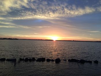 View of calm sea at sunset