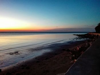 View of beach at sunset