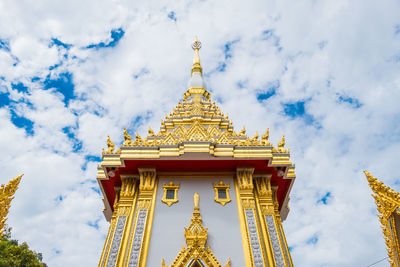 Low angle view of temple against building