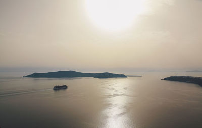 High angle view of cruise ship in sea against clear sky on sunny day