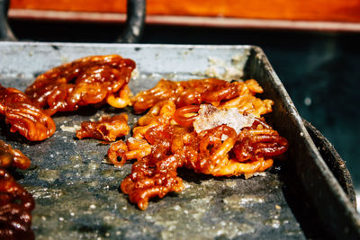 Close-up of meat on barbecue grill