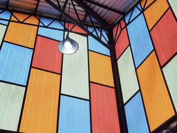 Low angle view of multi colored glass ceiling