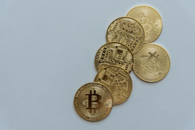 Close-up of coins against white background