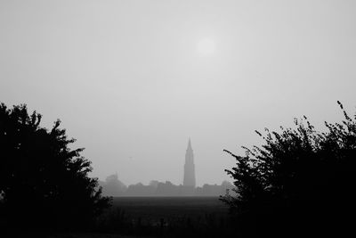 Silhouette of building against clear sky