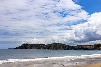 Scenic view of beach against sky