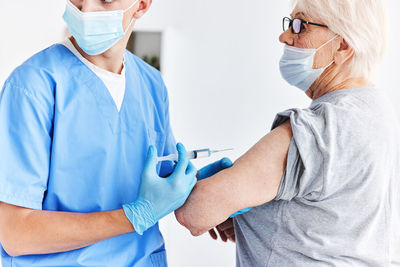 Female doctor giving medicine