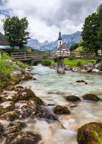 Scenic view of stream against sky