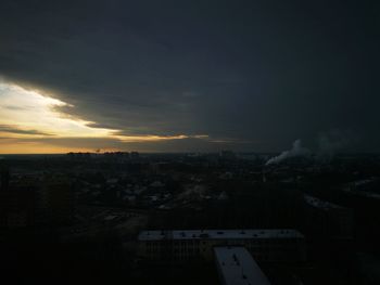 High angle view of buildings against sky during sunset