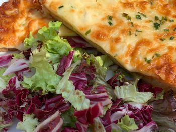 Close-up of pizza served in plate