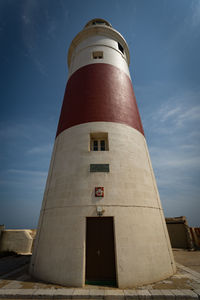 Low angle view of lighthouse against sky