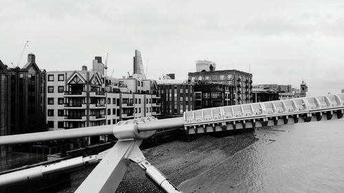 Buildings in city against sky