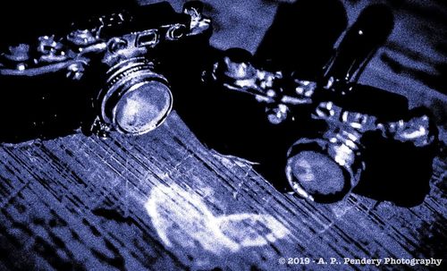 High angle view of drinking glass on table