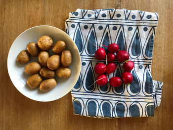 High angle view of fruits in plate on table