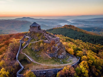 Scenic view of landscape against sky during sunset