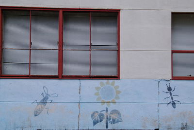 Full frame shot of window on wall of building