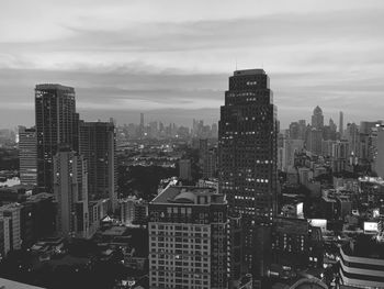 High angle view of buildings in city against sky