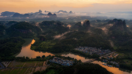 High angle view of townscape against sky during sunset