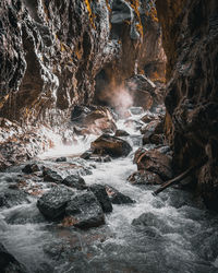 Stream flowing through rocks