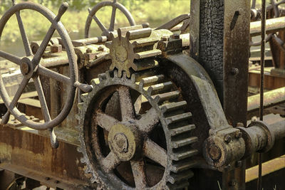 Close-up of abandoned rusty wheel