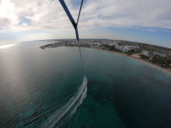 High angle view of sailboats on sea against sky