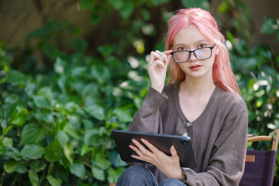 Young woman using mobile phone