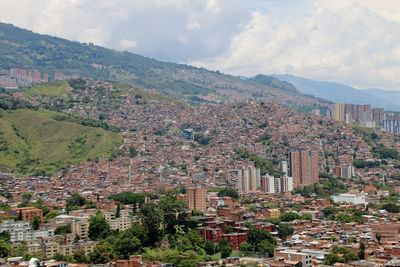 High angle view of townscape and mountains against sky in colombia 