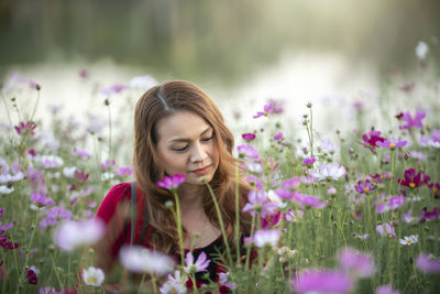 Beautiful woman with pink flowers