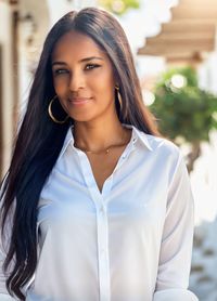 Portrait of young woman looking away