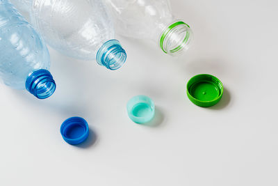 High angle view of green bottles on table